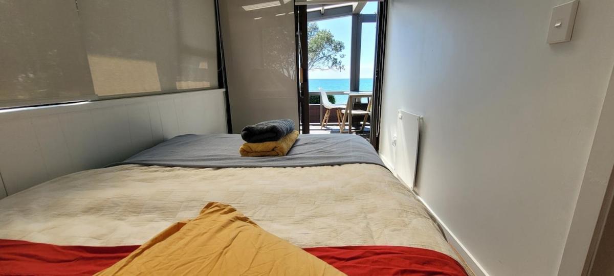 Beachfront Bliss - Your Parapara Seaside Retreat Buitenkant foto