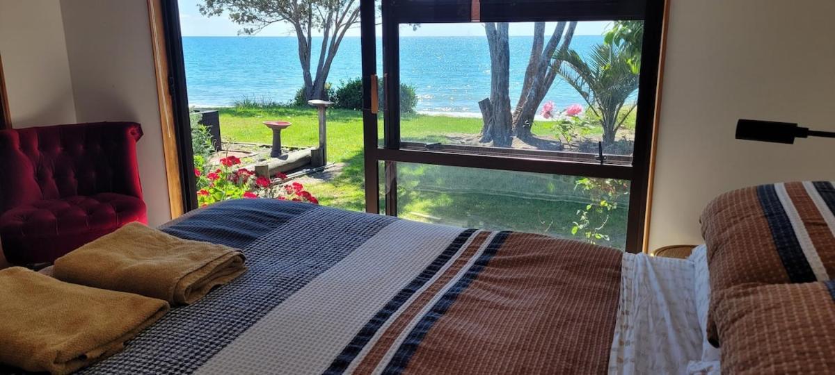 Beachfront Bliss - Your Parapara Seaside Retreat Buitenkant foto